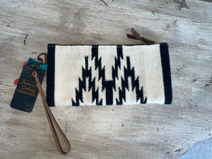 front of cream and black wristlet
