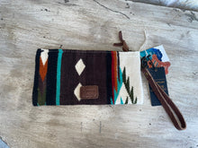 Load image into Gallery viewer, back of brown, turquoise and rust wristlet
