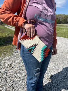 wrislet/clutch shown with person holding it