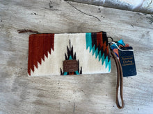 Load image into Gallery viewer, Cream, turquoise, and rust colored American Darling wristlet/clutch