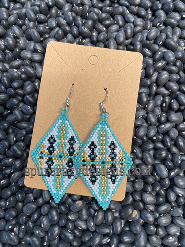 Rhombus shaped earrings made from glass beads colored turquoise, gold, black and white.  Has wire earring hooks
