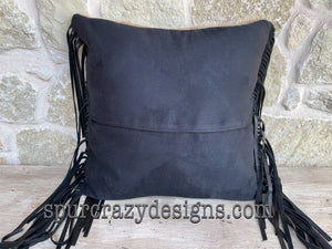 Black micro suede back on black trimmed pillows.